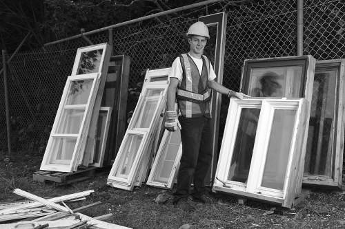 Professionals removing furniture from a home in Seven Kings